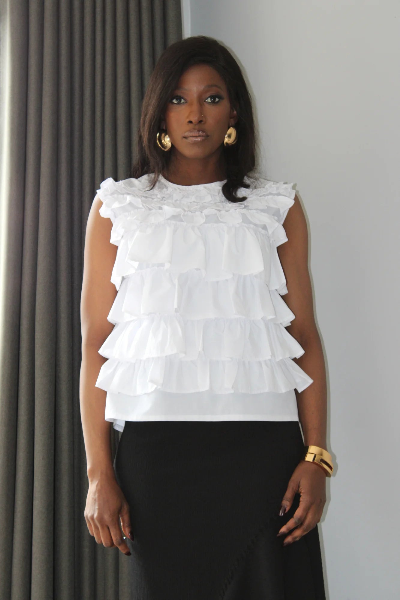 White ruffle blouse sleeveless hotsell
